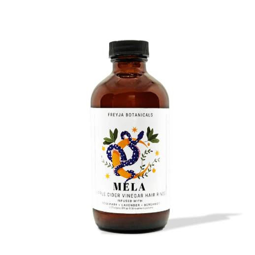 8oz. apothecary glass bottle of Mela Rinse; Apple Cider Vinegar hair rinse, infused with botanicals and pure essential oils.